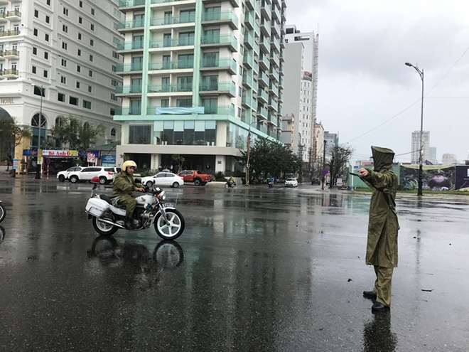 Lực lượng Công an “đội mưa” đảm bảo ATGT trước thềm APEC - Ảnh minh hoạ 7