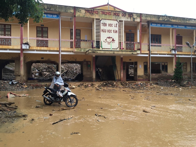Lực lượng CAND giúp dân khắc phục hậu quả mưa lũ - Ảnh minh hoạ 5