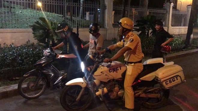 Cảnh sát trắng đêm chống đua xe sau chiến thắng của U23 Việt Nam - Ảnh minh hoạ 27