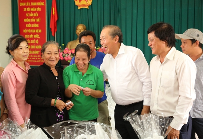 Phó Thủ tướng Thường trực Trương Hòa Bình trao quà Tết cho người nghèo - Ảnh minh hoạ 13