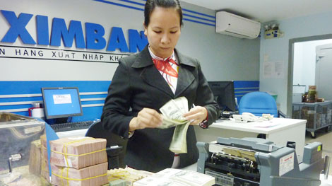 USD tăng giảm trong biên độ cho phép