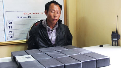 Dùng xe tải vận chuyển 31 bánh heroin