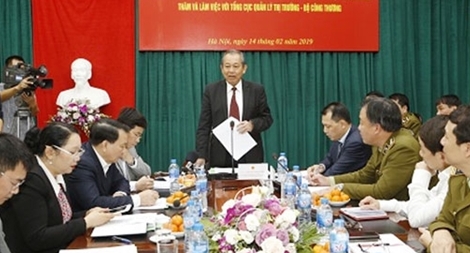 Phó Thủ tướng Trương Hòa Bình thăm và làm việc tại Tổng cục Quản lý thị trường