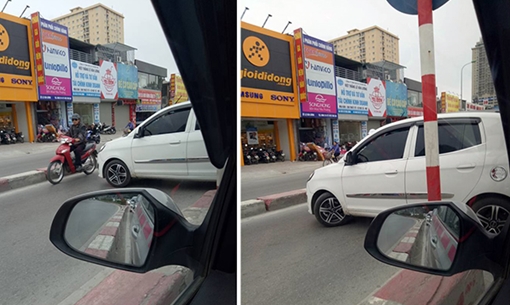 Kia Morning hồn nhiên quay đầu trên cầu vượt Lê Văn Lương