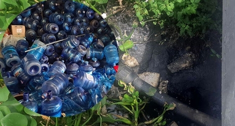 Khẩn cấp thu hồi sản phẩm nước uống đóng bình lấy từ mương nước thải