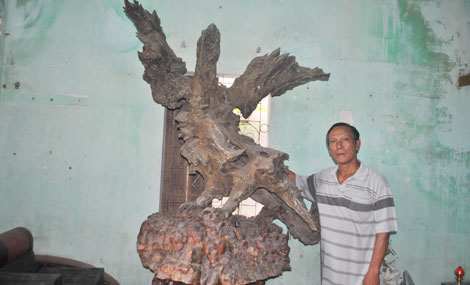 Người tạo "hồn" cho gỗ lũa