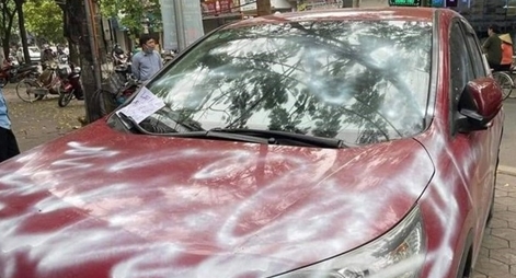 Điều tra vụ Honda CR-V đỗ trên vỉa hè bị xịt sơn