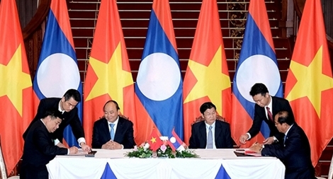 Quan hệ hữu nghị vĩ đại, tình đoàn kết đặc biệt Việt Nam-Lào ngày càng đơm hoa kết trái
