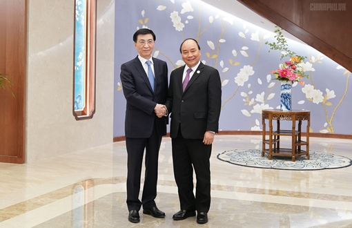 Thủ tướng Nguyễn Xuân Phúc hội kiến đồng chí Vương Hộ Ninh