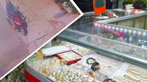 Chưa đầy 3 phút, tên cướp dùng búa đập tủ kính cướp cả đống nữ trang
