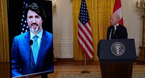 Lãnh đạo Mỹ-Canada lần đầu họp mặt... qua màn ảnh nhỏ