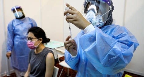 Chính quyền Biden đồng ý "xóa độc quyền" vaccine COVID-19 