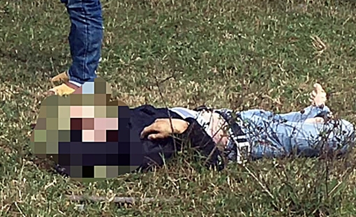 Nam thanh niên tử vong cạnh xe máy ở bãi đất trống