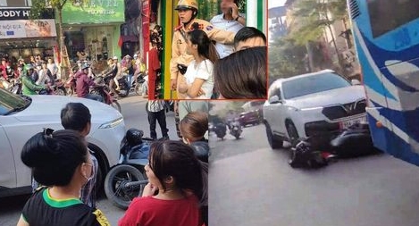 Ô tô SUV kéo lê xe máy SH trên phố Khâm Thiên