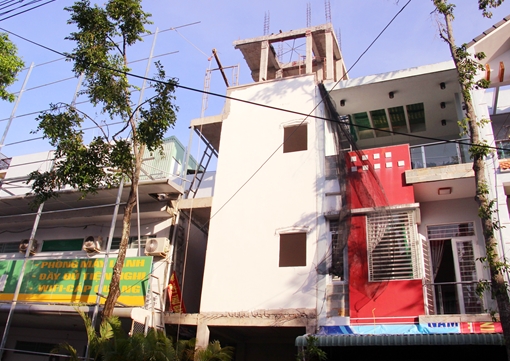 Chủ công trình xây dựng làm nứt nhà hàng xóm phải bồi thường gần 900 triệu đồng