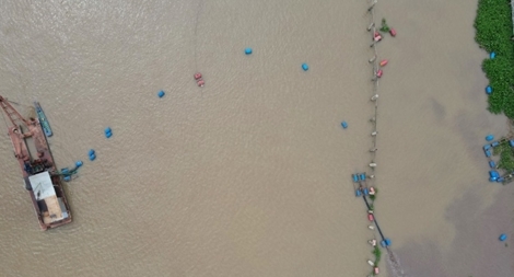 Thuê đất nuôi trồng thủy sản rồi tự ý khai thác khoáng sản có dấu hiệu vi phạm luật